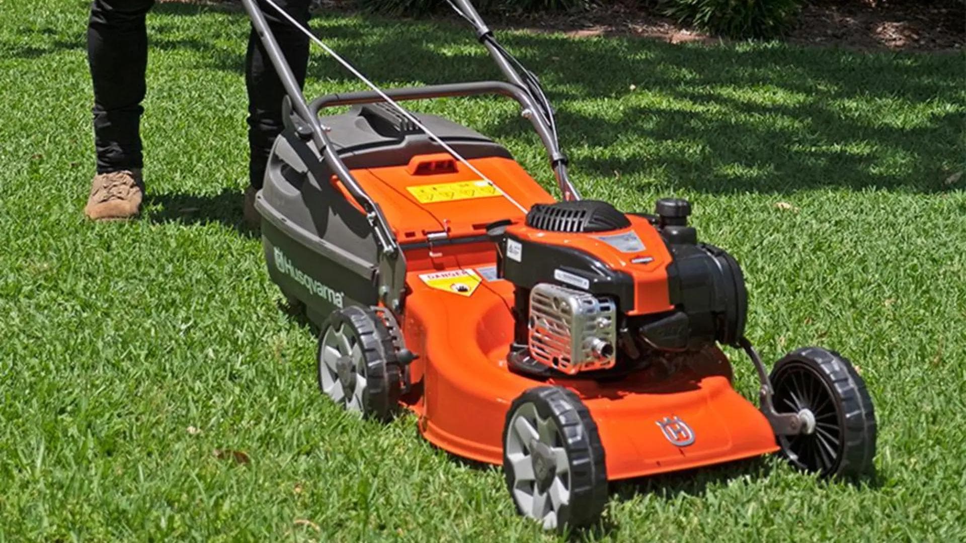 husqvarna lawnmower in green grass