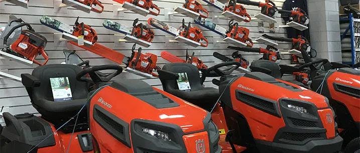 Interior of store with ride on lawn mowers